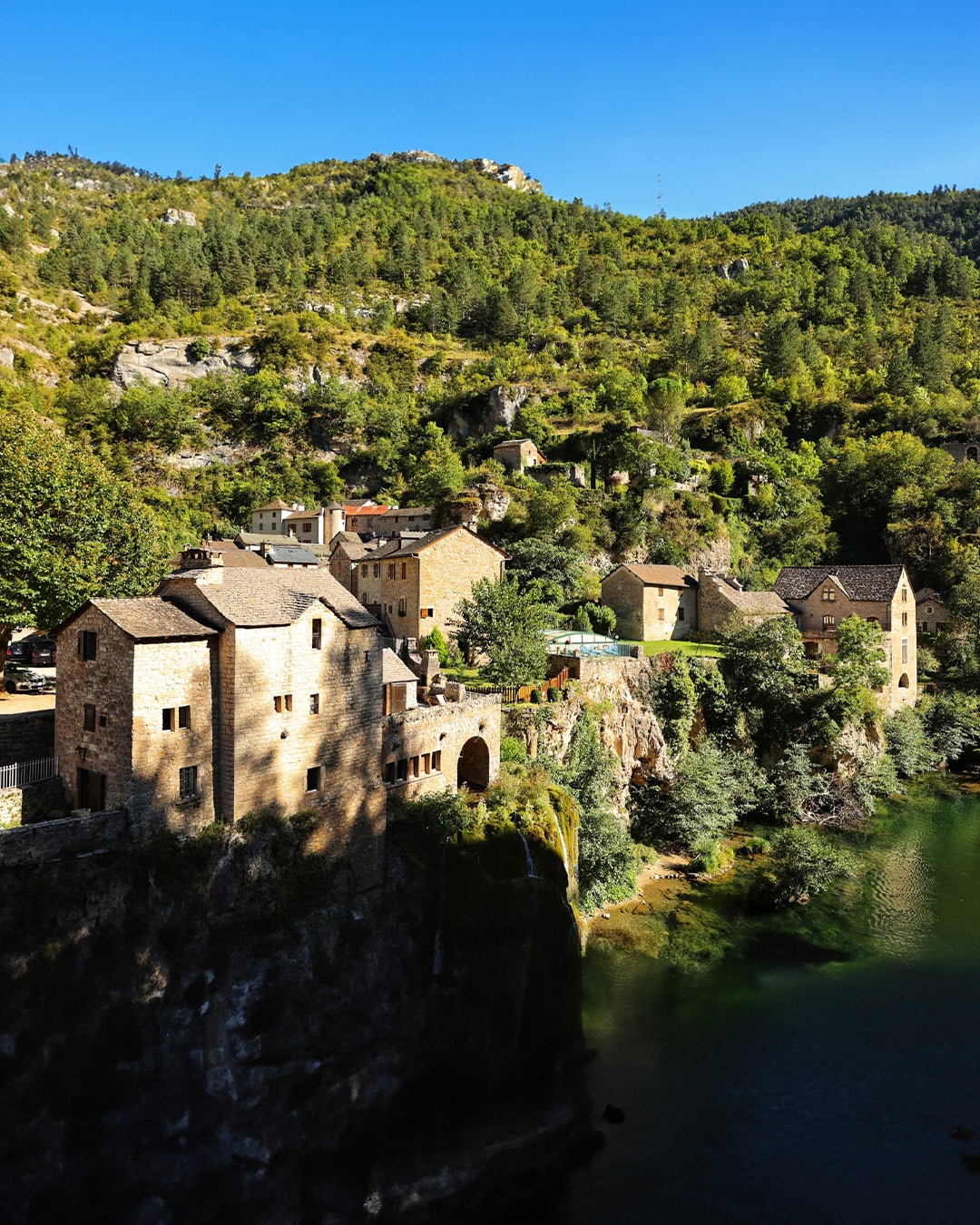 Participant at a yoga retreat in France, surrounded by serene natural landscapes.