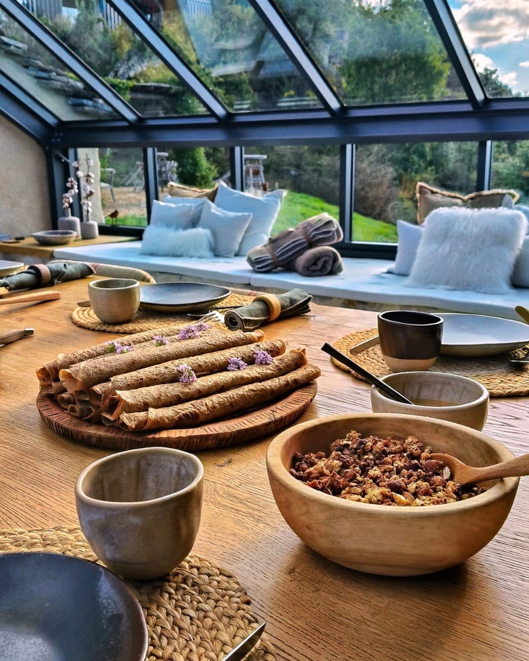 Participant at a yoga retreat in France, surrounded by serene natural landscapes.