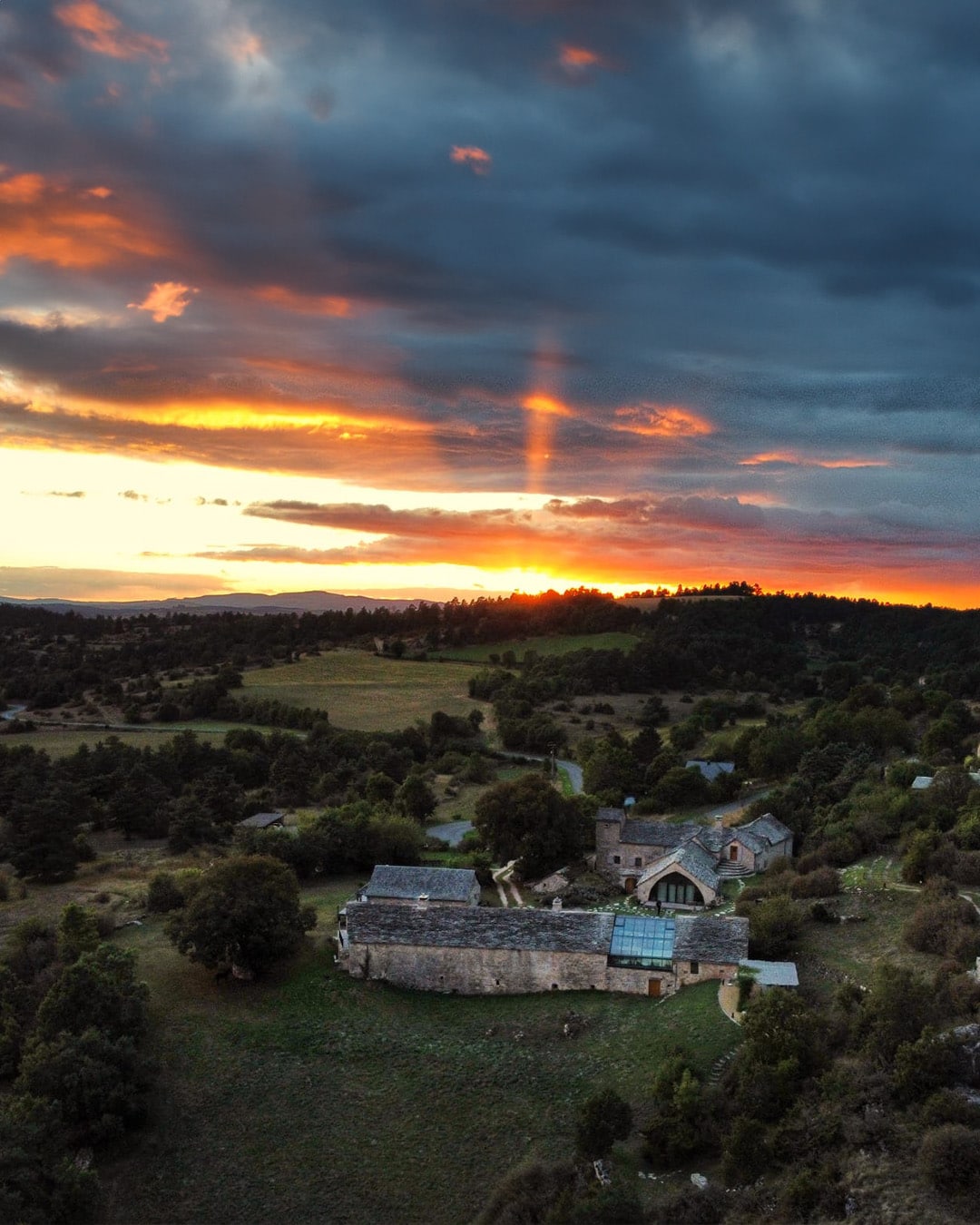 Participant at a yoga retreat in France, surrounded by serene natural landscapes.