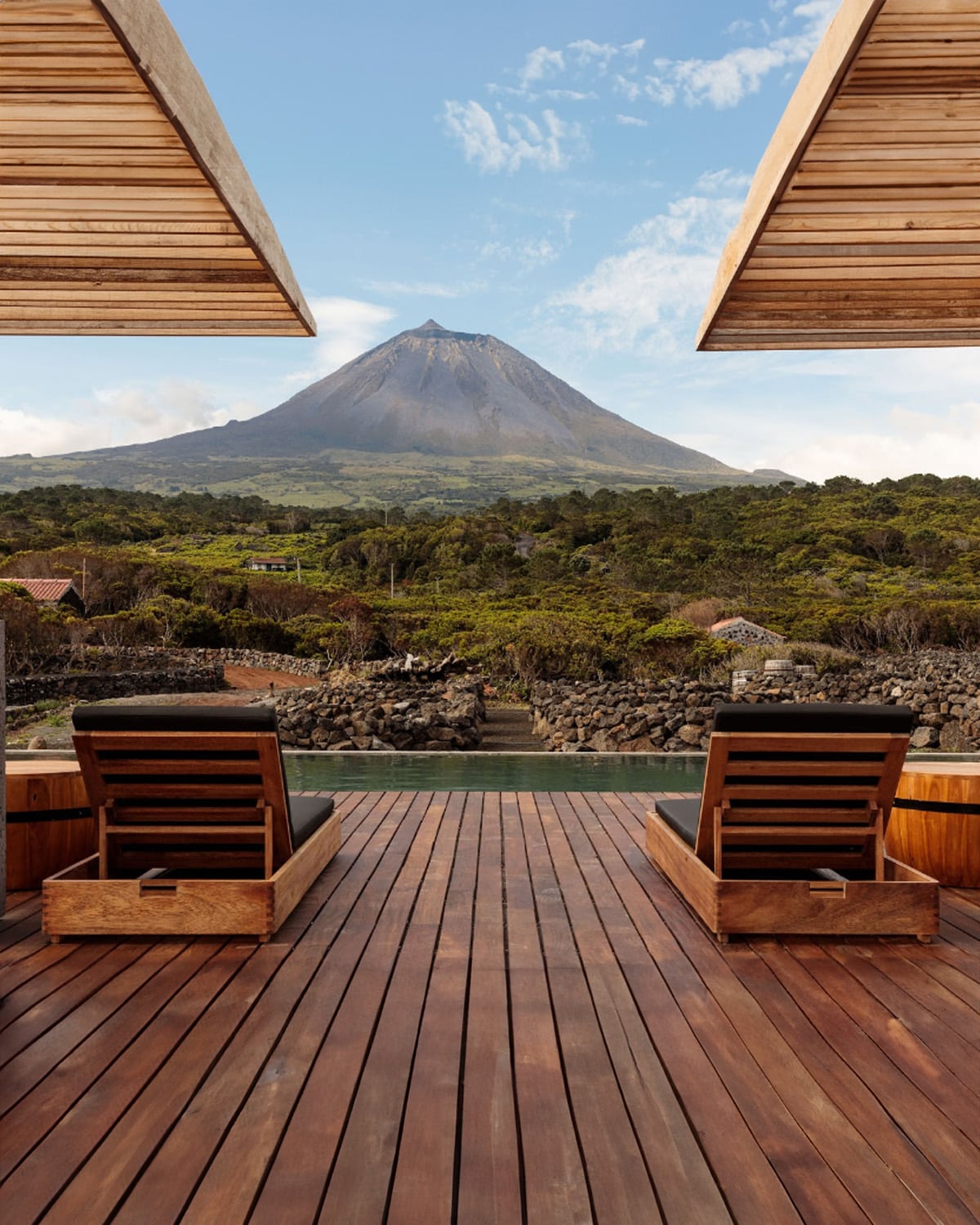 A group exploring the scenic volcanic landscapes of the Azores on a small group tour