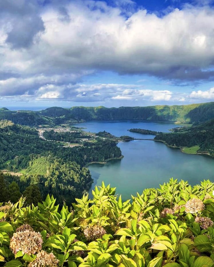 A group exploring the scenic volcanic landscapes of the Azores on a small group tour