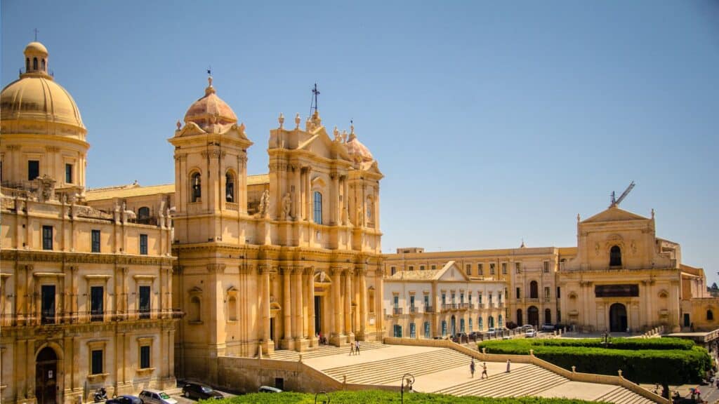 Baroque architecture of Noto Cathedral in Sicily under a bright sky