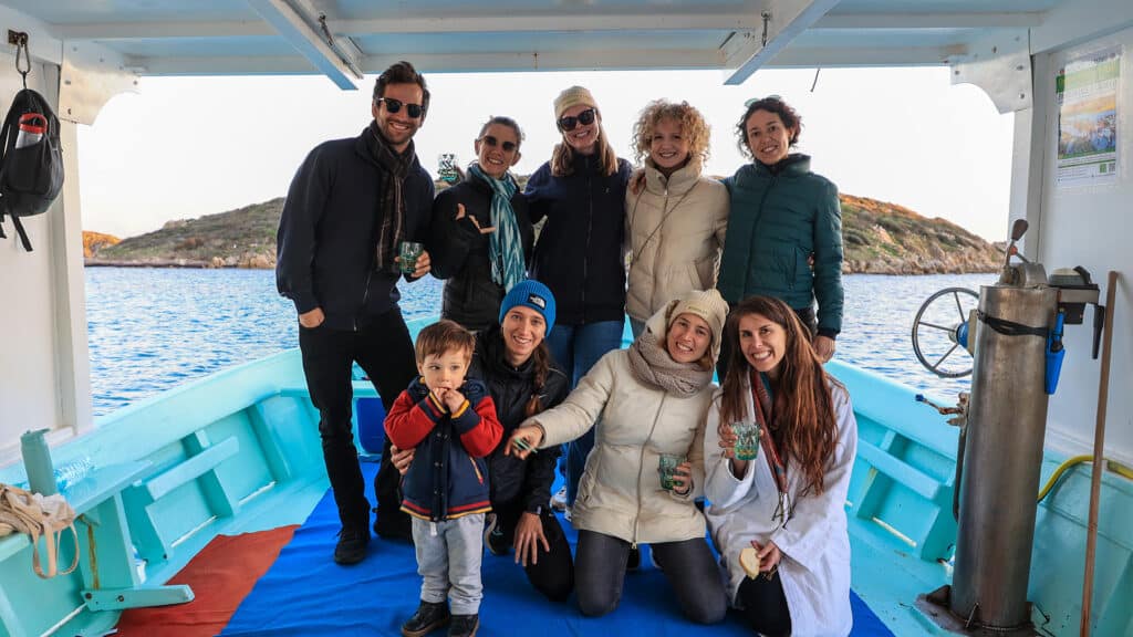 Travelers Enjoying A Small Group Tour Along Sardinia’s Southern Coast During A Scenic Exploration Of Italy.