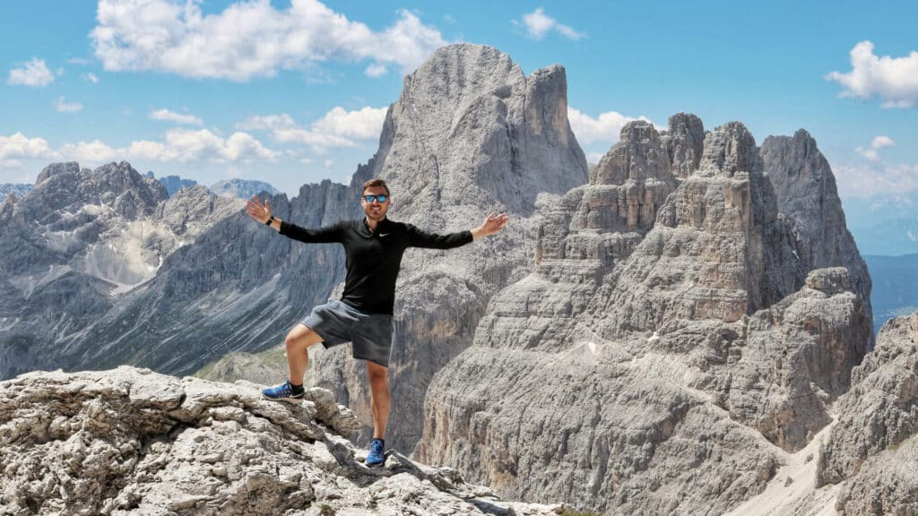 Travel Facilitator Jonathan At The Summit Of A Hike In The Dolomites, Val Di Fassa, After Completing An Invigorating Mountain Trek.